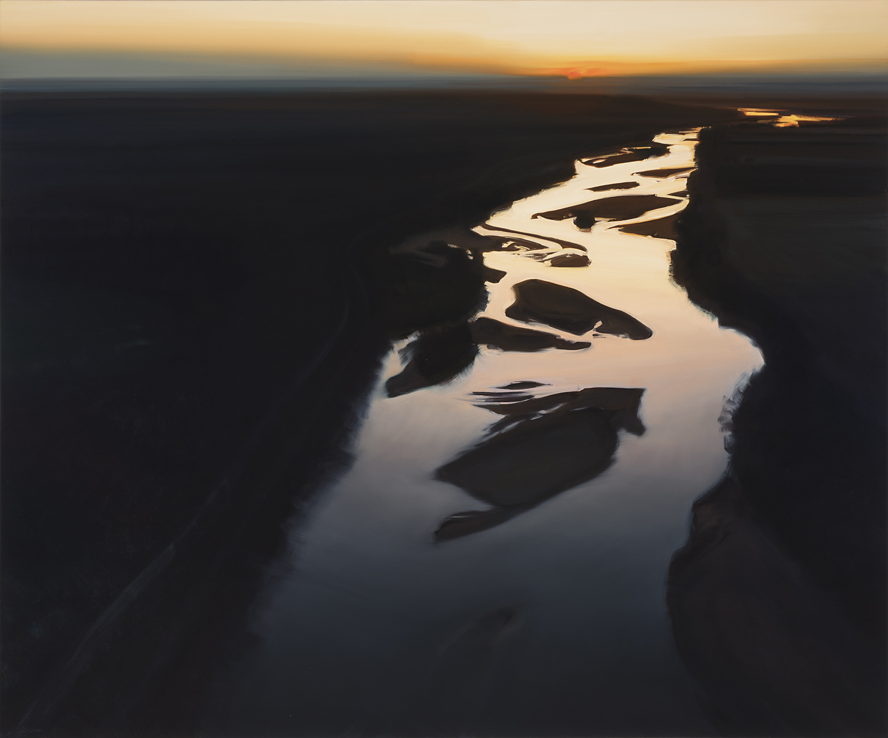 A river illuminated by the orange hues of a horizon flows through the middle of a dark landscape 