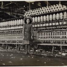 <a href="https://spencerartapps.ku.edu/collection-search#/object/11080" target="_blank"><i>Young Girl in Textile Factory</i> by Lewis Wickes Hine</a>