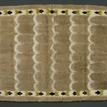 <a href="https://spencerartapps.ku.edu/collection-search#/object/33888" target="_blank"><i>eider duck blanket</i> by Greenland Inuit peoples</a>