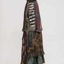 <a href="https://spencerartapps.ku.edu/collection-search#/object/34417" target="_blank"><i>egungun mask</i> by Oyo peoples</a>