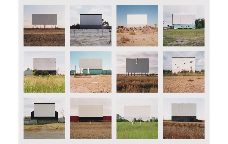 A collage of 12 photographs, 4 columns and 3 rows, that shows 12 abandoned drive-in movie theaters