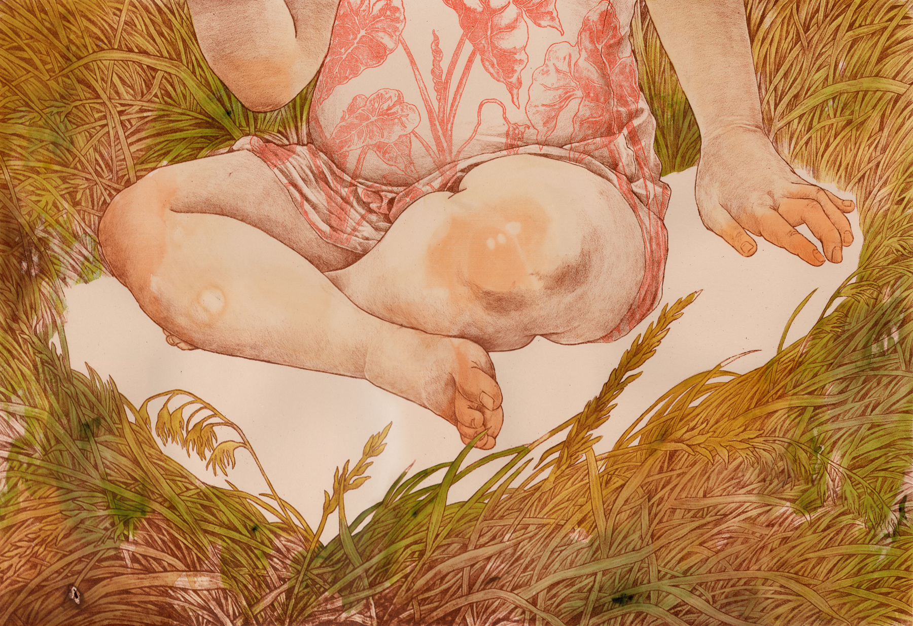 A child with light skin wearing a dress with pink plants is pictured from the chest down and sits cross-legged in a bare spot of ground surrounded by greenish-brown grasses