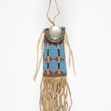 <a href="https://spencerartapps.ku.edu/collection-search#/object/35302" target="_blank"><i>strike-a-light bag</i> by Kiowa peoples</a>