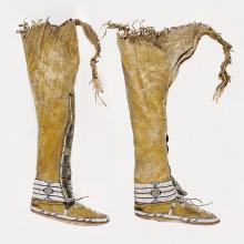 <a href="https://spencerartapps.ku.edu/collection-search#/object/33408" target="_blank"><i>pair of beaded boots</i> by Arapaho or Cheyenne peoples</a>