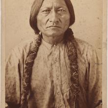 <a href="https://spencerartapps.ku.edu/collection-search#/object/32593" target="_blank"><i>portrait of Sitting Bull</i> by David Francis Barry</a>