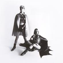 <a href="https://spencerartapps.ku.edu/collection-search#/object/14088" target="_blank"><i>"Yes, it's Batman and Robin, and yes, it's Andy Warhol and his latest girl-person (named Nico), and that, friends, is the Sixties whether you like it or not..."</i> by Frank Bez</a>